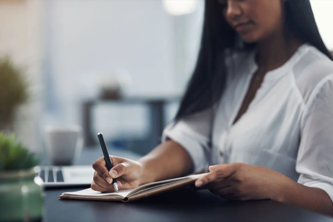 noting-down-woman-writing-notes